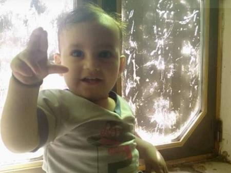 بالصورة: يمني يذبح طفله ويفصل رأسه عن جسده!