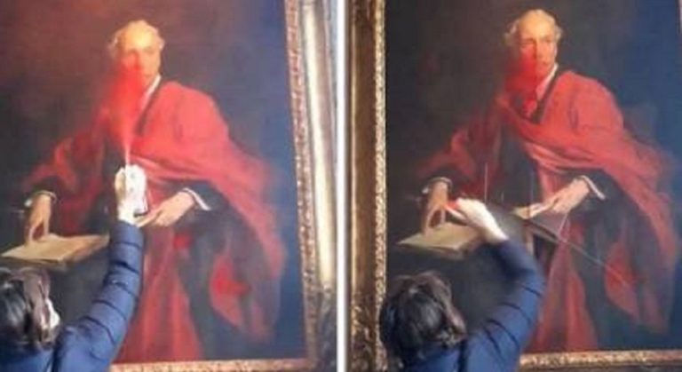 بالفيديو.. ناشطة تتلف صورة صاحب وعد بلفور!