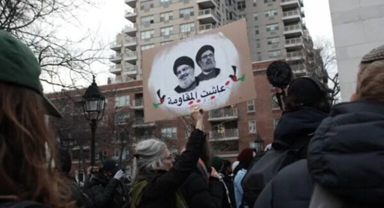 صور الشهيدين نصر الله وصفي الدين تملأ حديقة واشنطن (صور)